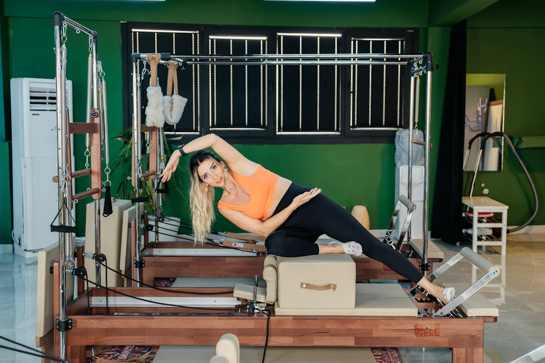 Elevate Your Home Gym with Pilates Reformers and Towers