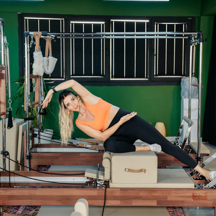 Elevate Your Home Gym with Pilates Reformers and Towers